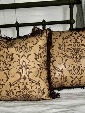 TWO FAUX LEATHER PILLOWS… Embroidered damask design… 18” x 18”